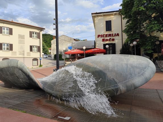 . The fountain on Jože Srebrnič Square, symbolising the Soča River between the nearby hills (by Sadar+Vuga), was created on the occasion of the celebration of the millennium of the first written mention of Solkan in 2001. &copy;Photo: Blaž Kosovel